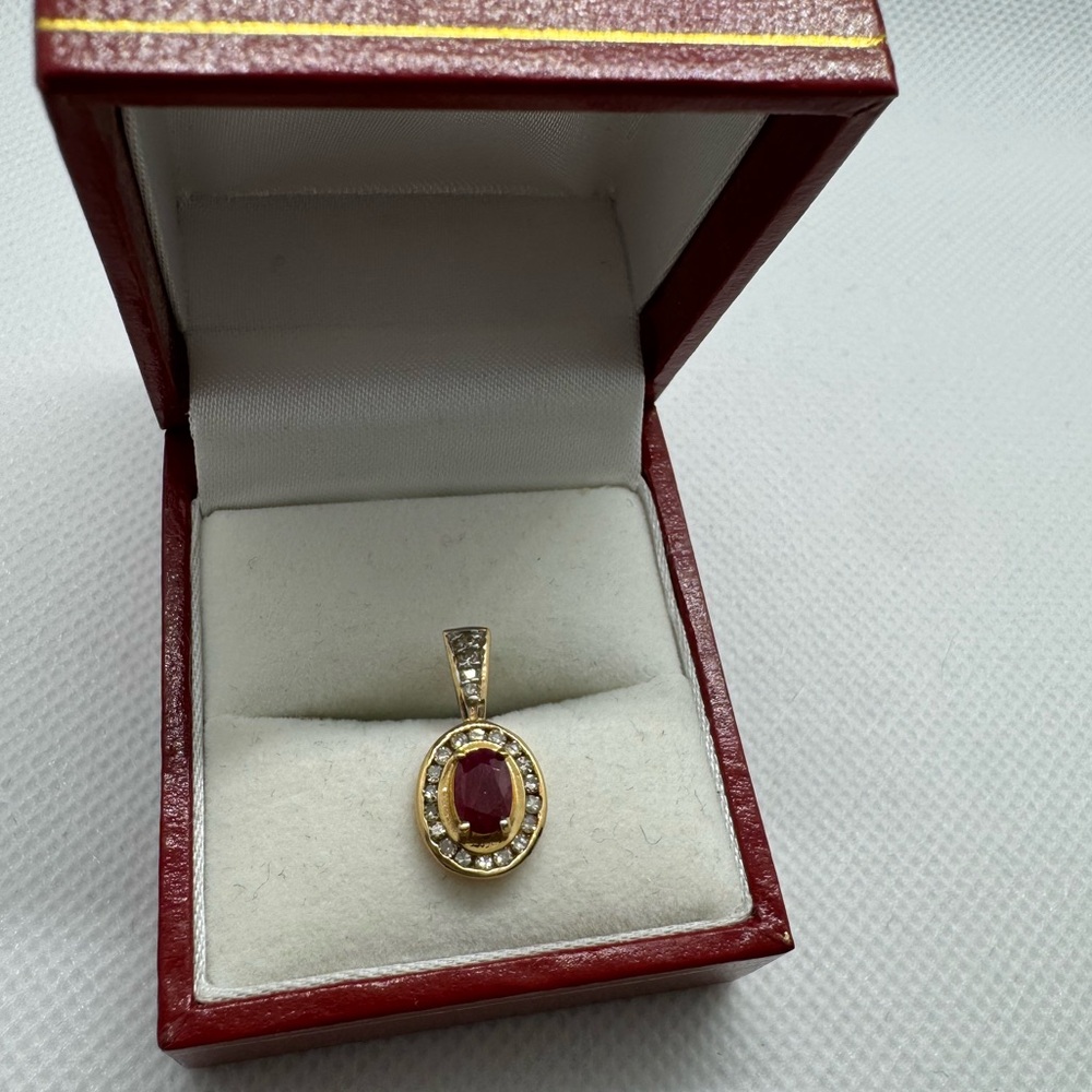 14 K genuine Ruby and diamond pendant